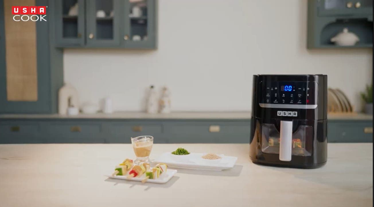 Usha air fryer with styled snacks
