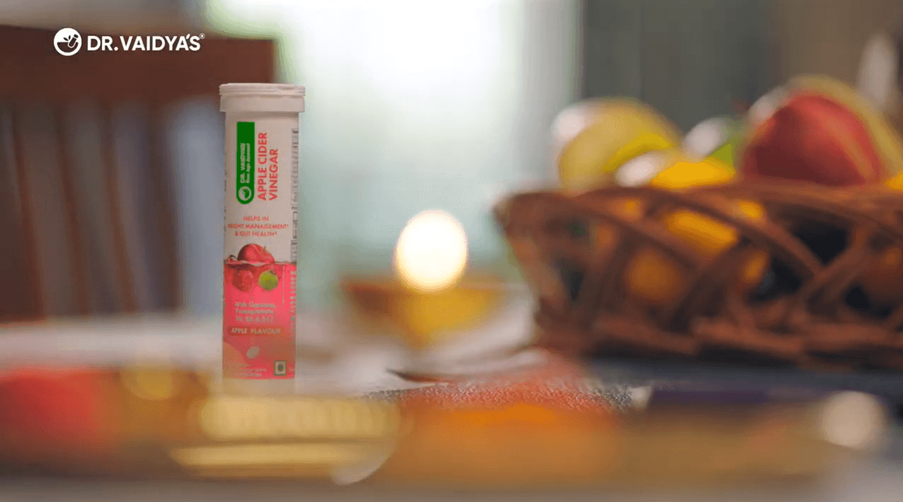 Apple cider vinegar tube on a festive table
