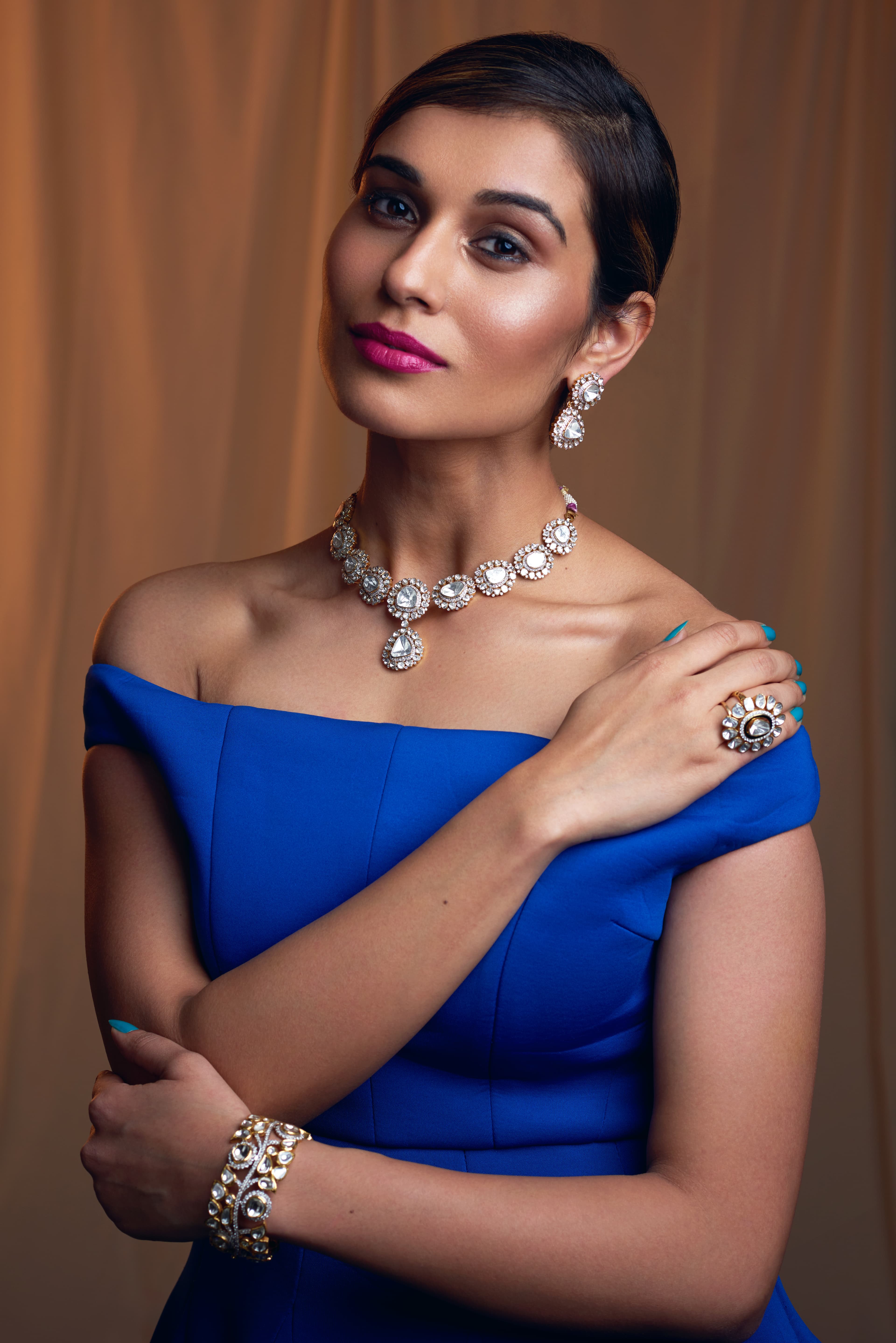 Polki necklace with a cobalt gown