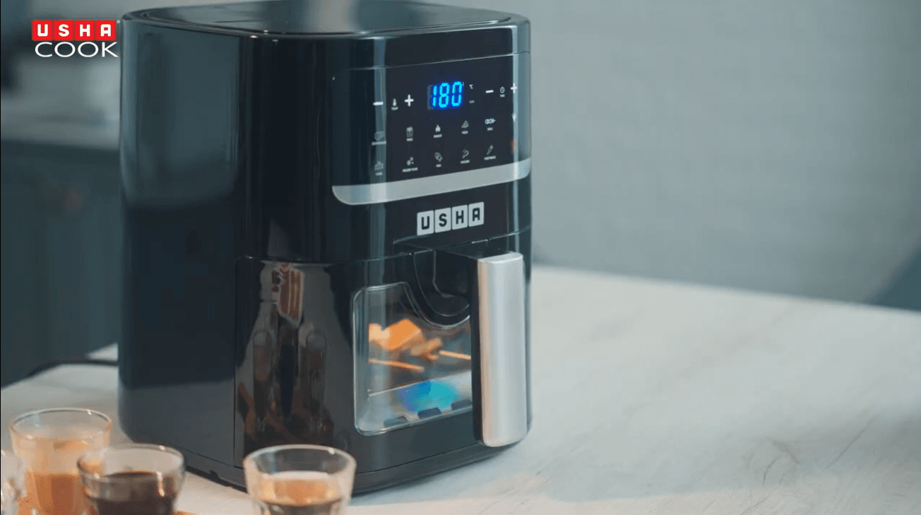 Glowing air-fryer display close-up